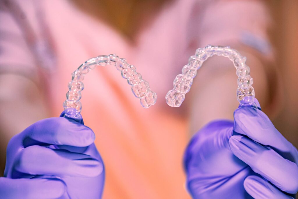 holding an aligner